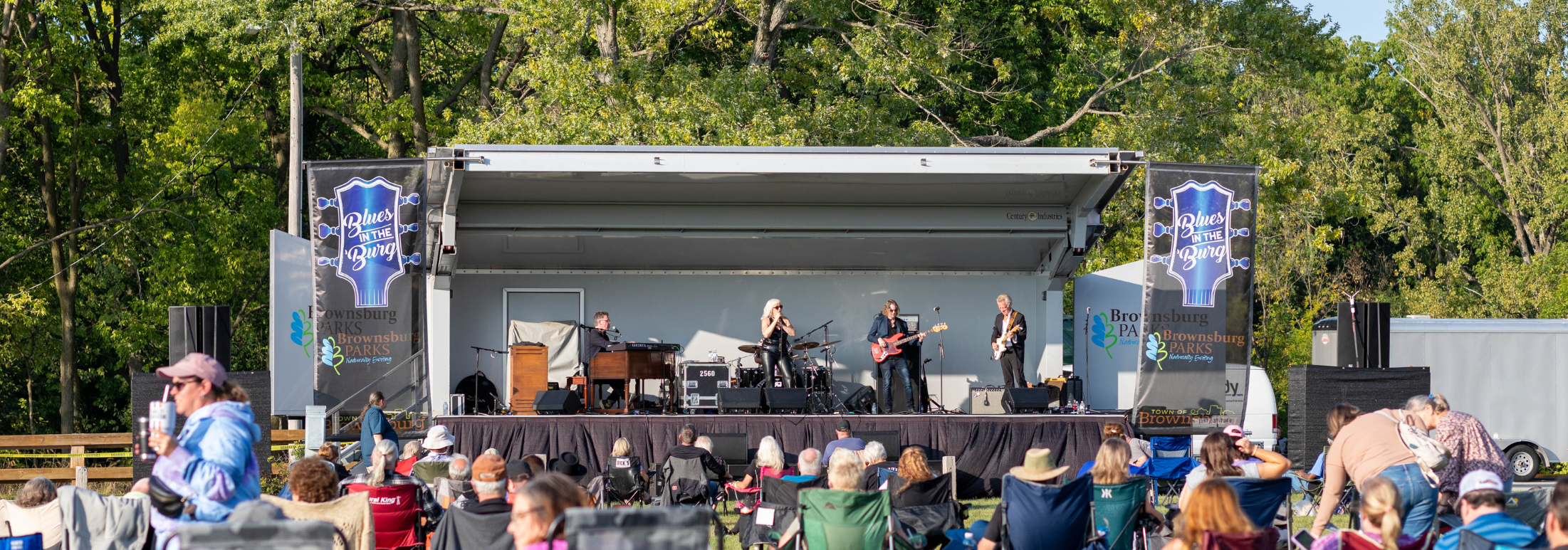 band performs on stage during Blues in the 'Burg